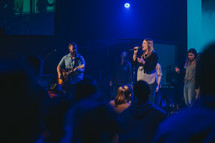 worship leaders in song during a worship service 