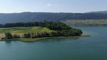aerial of peninsula st. peter in lake biel in switzerland