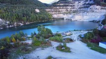Aerial view from above on blue lake in an old quarry