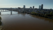 Aerial View of the Little Rock, Arkansas Skyline. Drone view flying over Arkansas River near downtown Little Rock.