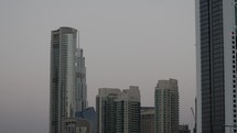Buildings, skyscrapers, architecture in downtown Dubai in UAE - United Arab Emirates.