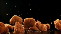 Chicken nuggets.  Filmed is slow motion 1000 fps.