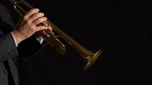 A trumpet soloist playing on stage