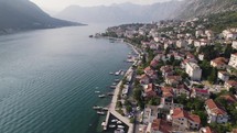 Drone flyover Kotor Bay, Scenic village by the Adriatic sea, Montenegro