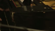 a pianist playing a piano 