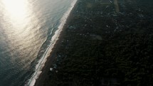 Birds Eye View Of Monterrico Town With Idyllic Beach During Sunrise On The Pacific Coast Of Guatemala. Aerial Shot