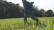 boy child spinning outdoors 