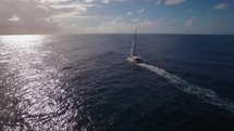Ocean skyline and sailing yacht, aerial view