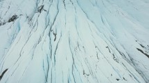 Close Up Of Deep Cracks In A Glacier	