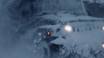 Jeep driving through snow 