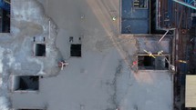 Workers pour concrete on a construction site