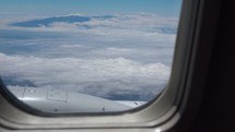 Airplane window view of Maui Hawaii.
