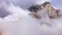 Rocky Peak with clouds and sunlight