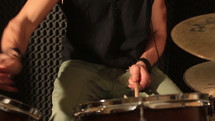 man playing drums 