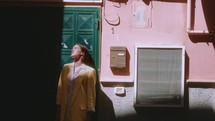 Woman standing in the streets of Italy