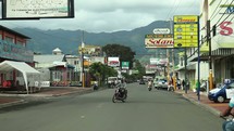 driving down a city street in the Dominican Republic