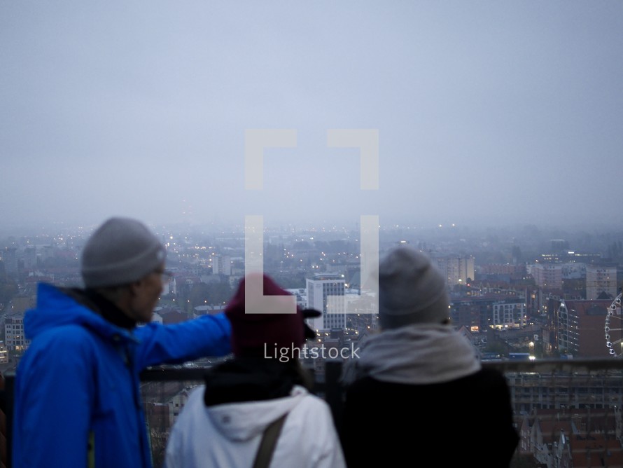 people looking out at a view of Gdansk, Poland