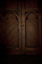 Ornate wooden doorway.