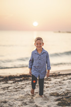 portrait of a little boy on a beach 