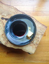communion wine in a chalice and bread 