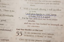 An underlined scripture in the Bible regarding giving thanks.