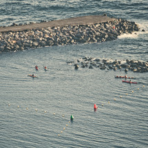 rock jetty and buoys in Tenerife, Spain