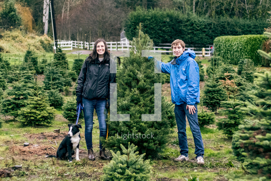 couple picking out a Christmas tree