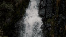 Tropical Jungle Waterfall In Cayambe Coca National Park, Papallacta, Ecuador - tilt down	