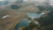 Aerial View Of Laguna Baños In Cayambe Coca Ecological Reserve In Napo, Ecuador.	