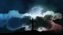 Full moon and silhouette of Holy Cross from Calvary hill. Concept of the Crucifixion of Christ.
