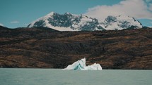 Distant View Of Iceberg On Lake Argentino, Los Glaciares National Park, Santa Cruz Province, Patagonia, Argentina. Wide Shot