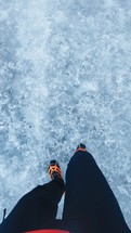 Walking With Boots On The Ice