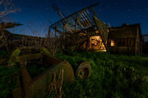 old barn under stars in a night sky 