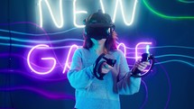 Woman playing a virtual reality game.