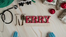 Merry Christmas medical background on table