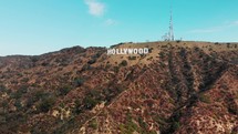 drone moves away from hollywood sign