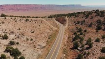Highway through mountain captured by drone