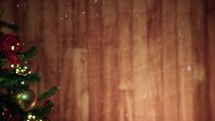Snowy falling with Christmas tree and wooden background, copy space