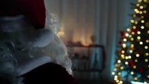 Santa Claus in the Christmas moody Atmosphere of a house 