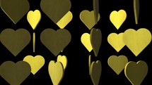Yellow 3D hearts rotating loop on black background