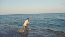 Miltary marine american man training running in the ocean