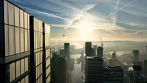 Bright Golden Sun Shining Through Buildings in London at Sunrise