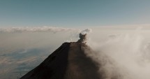 Scenic View Of Fuego Volcano Erupting Ashes And Volcanic Smog During Daytime In Antigua, Guatemala. aerial	