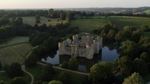 The Beautiful Bodiam Castle In England With Large Moat Drone Aerial Sunset