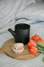 tea pot, muffins, and tulips 