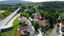 Aerial shot drone flies up and over Rastoke, Slunj, Croatia