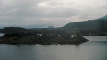 Volcano San Pedro at Lake Atitlan in Highlands of Guatemala - Village Santiago and San Pedro - aerial drone shot