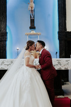 bride and groom in a sanctuary 