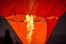 flames filling a hot air balloon 