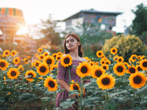 portrait of a teen girl in a field of sunflowers 